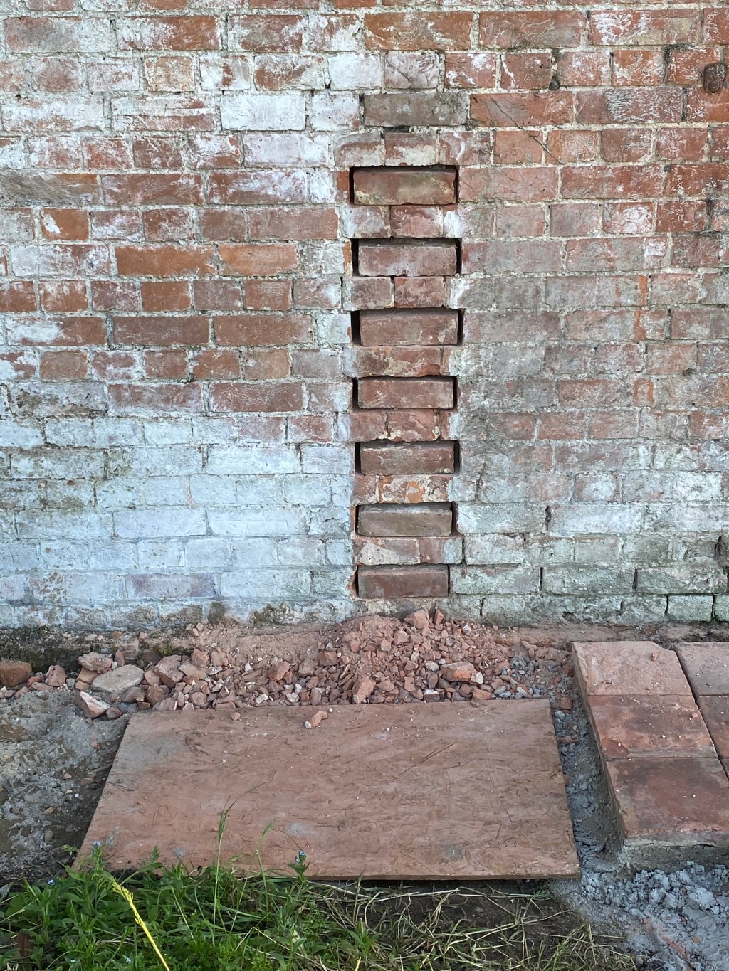 Chiselling out bricks